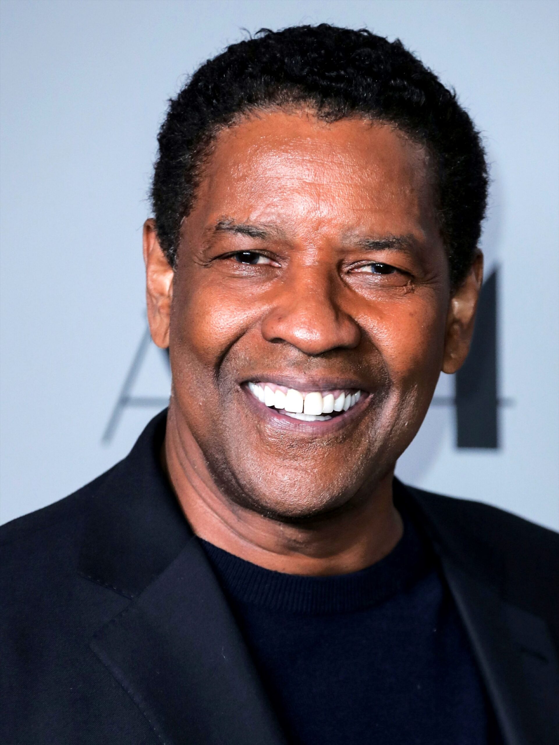 Denzel Washington - Compromiso con la formación y la comunidad